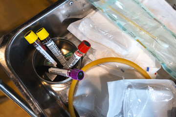 Wall Mural -  blood sample tube from blood donation with soft-focus and over light in the background