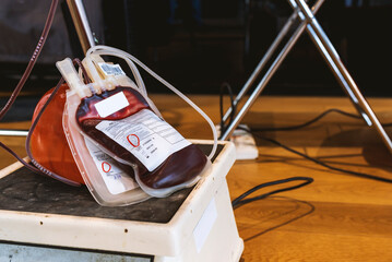 Wall Mural - blood bag obtained from blood donation with soft-focus and over light in the background