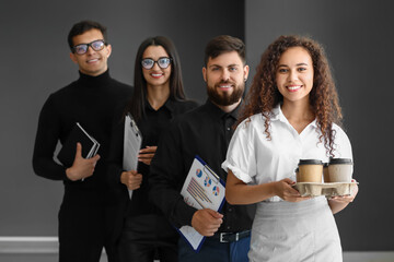 Canvas Print - Young business colleagues in office