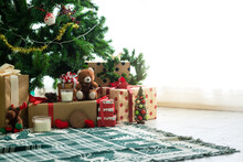 Bear Toy Presents And Gifts Under The Christmas Tree For Christmas On Floor, Family Traditional Celebration, Winter Holiday Concept