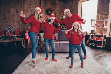 Wall Mural - Full length body size view of beautiful handsome cheery carefree family dancing having fun advent at decorated loft home indoors