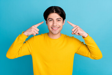 Poster - Photo of young man happy positive smile indicate fingers himself choise proud isolated over blue color background