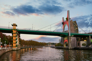 Wall Mural - Nervion river and La Salve bridge at evening, Bilbao