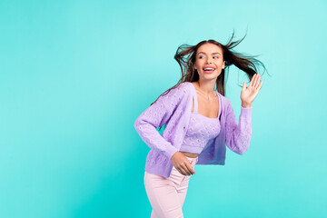 Sticker - Photo of interested friendly inspired lady wave hand wear violet cardigan isolated turquoise color background