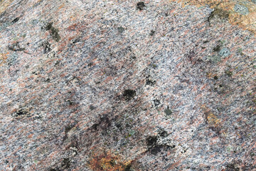 Wall Mural - Granite stone wall texture in a detailed close up view in a high resolution.