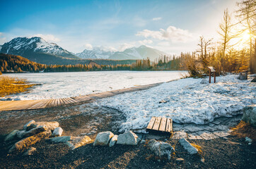 Sticker - Winter landscape of a frozen mountain lake on a frosty sunny day. Strbske pleso, High Tatras national park, Slovakia.