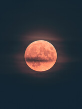 Eerie Scenery Of The Red Full Moon On A Night Sky