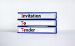 © Dzmitry - ITT invitation to tender symbol. Concept words ITT invitation to tender on books on a beautiful white table, white background. Business and ITT invitation to tender concept. Copy space.