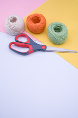 Canvas Print - decoration yarn felt sheet and scissors on a bright wooden background