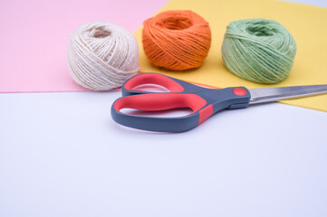 Canvas Print - decoration yarn felt sheet and scissors on a bright wooden background