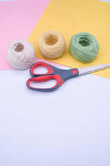 Canvas Print - decoration yarn felt sheet and scissors on a bright wooden background