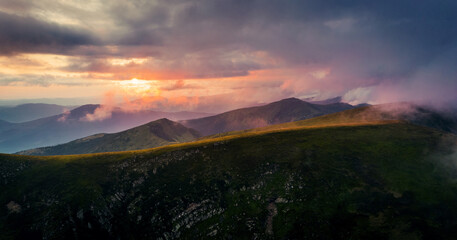 Canvas Print - Panorama of mountains at sunset after rain