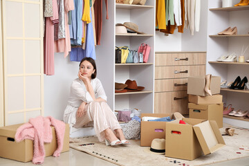 Wall Mural - Upset young woman in dressing room