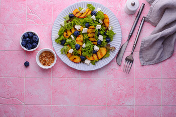 Wall Mural - Salad with grilled peach, blueberry and feta