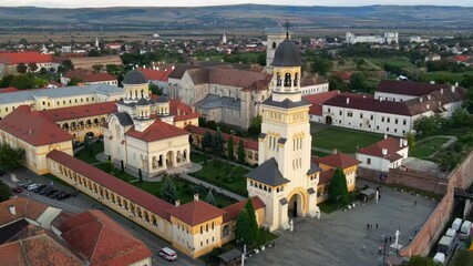 Wall Mural - Aerial drone view of Alba Carolina Citadel in Alba-Iulia, Romania. Cityscape, multiple buildings, church, people