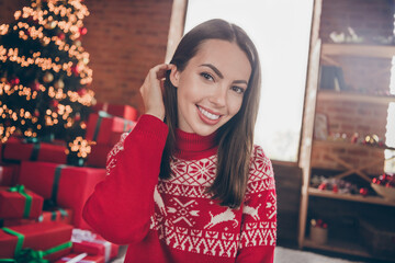 Sticker - Photo of pretty adorable young woman dressed red sweater enjoying new year smiling indoors room home house