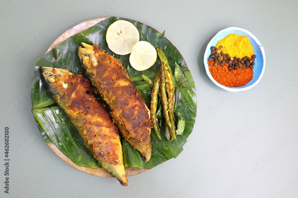 Indian Mackerel fish fry. Bangda Rava fry. whole Fried fish served on a ...
