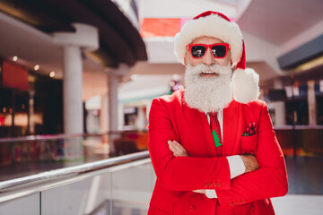 Sticker - Photo of confident funny santa folded arms prepare x-mas gifts wear sunglass hat red tuxedo in supermarket mall center