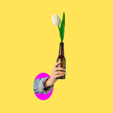 Contemporary Art Collage Of Female Hand Holding Beer Bottle With Tulip Flower Inside Isolated Over Yellow Background