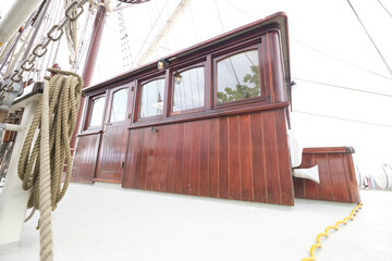 Poster - wooden ship cabin with white background on a sailing yacht