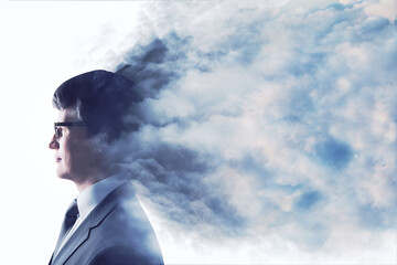 Poster - Abstract head in clouds concept. Male silhouette on white sky background with mock up place. Double exposure.