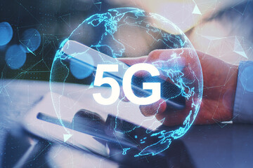 Poster - Close up of hand using tablet and smartphone with abstract globe 6G hologram on blurry background. Technology, data and future concept. Double exposure.