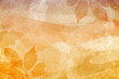 © Arlenta Apostrophe - background with leaves, fall or autumn background in orange brown and gold colors with painted watercolor texture and grunge on abstract wavy striped shape pattern, thanksgiving or October background