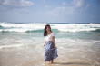 © Andr√©s Benitez/Westend61 - Portrait of laughing woman standing at seaside, Fuerteventura, Spain