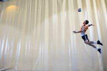 Man Jumping During A Volleyball Match To Start A Game