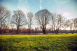 © LOUIS CHRISTIAN/Westend61 - Young man jogging in a park