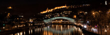 Georgia, Tbilisi, Bridge Of Peace And Narikala Fortress At Night