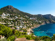 Spain, Balearic Islands, Andratx, Town Along Coast Of Calo Des Llamp Bay In Summer