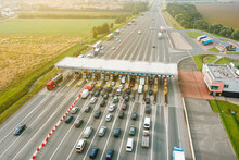 An Overhead View Of A Busy Toll Road With Many Cars Queuing Up To Pay The Highway Toll