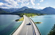 © Christian Vorhofer/Westend61 - Aerial view of a car crossing a bridge, Sylvenstein Dam, Bavaria, Germany