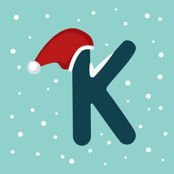 Letter K with snow and red Santa Claus hat. Festive font for Christmas and New Year
