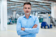 © Daniel Ingold/Westend61 - Portrait of confident businessman in a factory hall