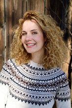Blonde Woman With Curly Hair Smiling, Norwegian Sweater