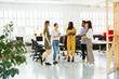 © BONNINSTUDIO/Westend61 - Colleagues standing and brainstorming in office