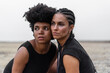 © Eloisa Ramos/Westend61 - Portrait of two women head to head in bleak landscape