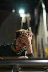 Portrait of man in theatre working on script