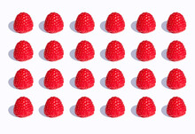 3D Illustration, Raspberries In A Row On White Background