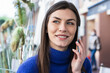 © NOVELLIMAGE/Westend61 - Smiling beautiful woman talking on mobile phone while looking away