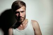 © Sandro Joedicke - WHITEDESK,Sandro J√∂dicke |¬†whitedesk/Westend61 - Handsome man beard staring against white background