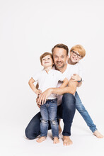 Happy Father With Sons Against White Background