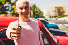 Teenage Boy's Hand Holding Car Key