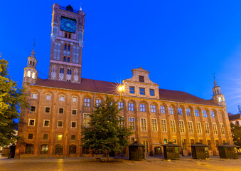 Wall Mural - Torun. Old market square and town hall at sunrise.