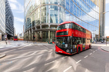 UK, London, Red Double Decker Bus # With Modern Buildings In Background