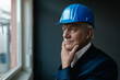 © Gustafsson/Westend61 - Portrait of a confident senior businessman wearing hard hat