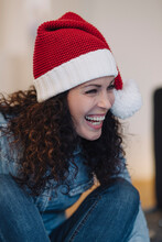 Portrait Of Laughing Woman, Wearing Santa Hat