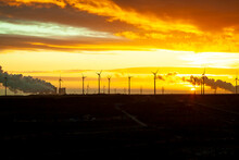 Garzweiler Brown Coal Mining At Sunrise With Wind Park In The Background, Juechen, Germany